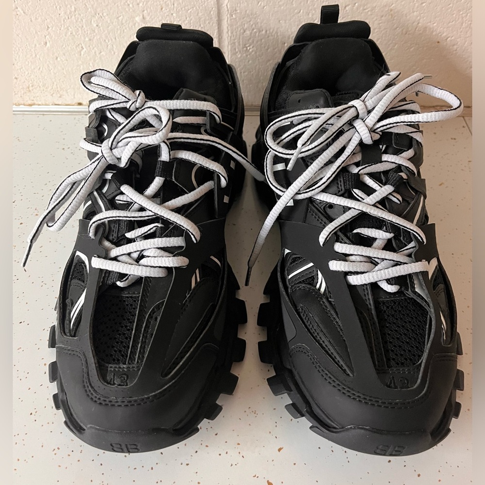Track Sneaker in black and mesh nylon.